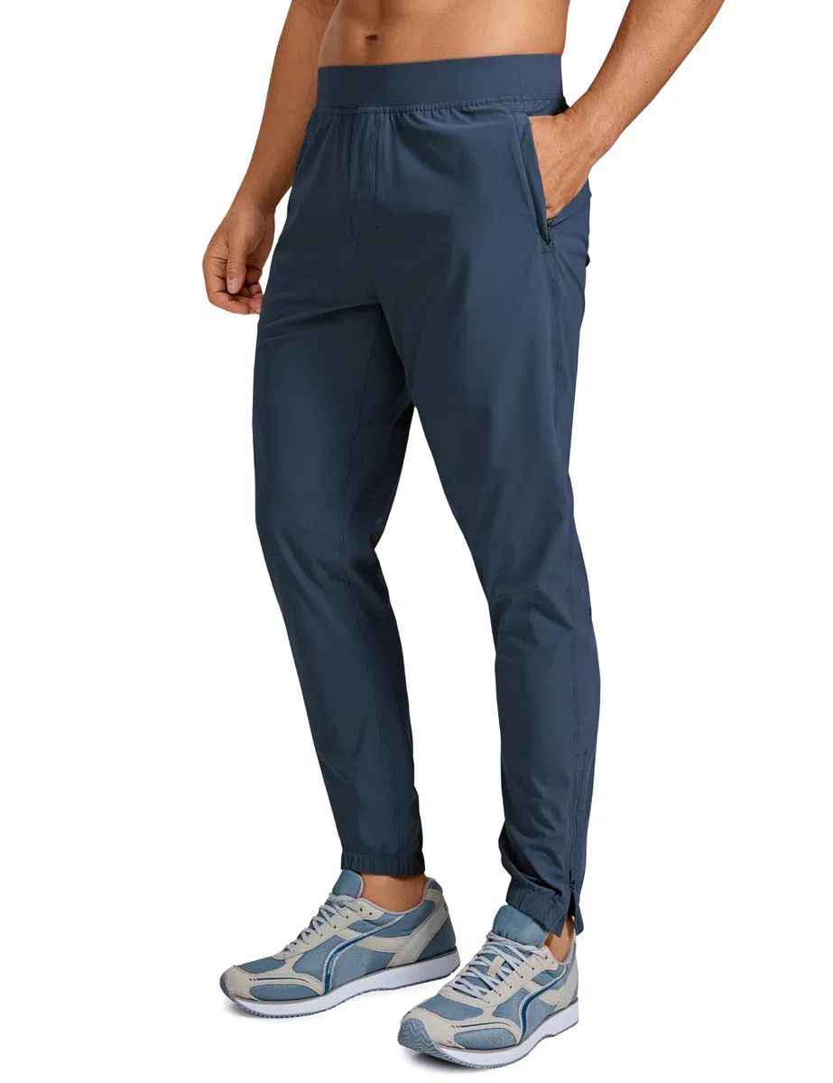 CRZ YOGA Athletic Joggers para Hombre Ligero Ejecutar Formación Pantalones con Bolsillos con Cremallera y Cremalleras de Tobillo 29"