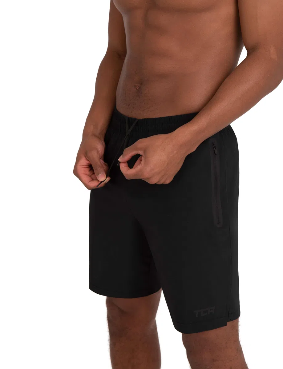 TCA Pantalones Cortos Elite Tech para Correr o Gimnasio con Bolsillos de Cremallera para Hombre - Negro, XL