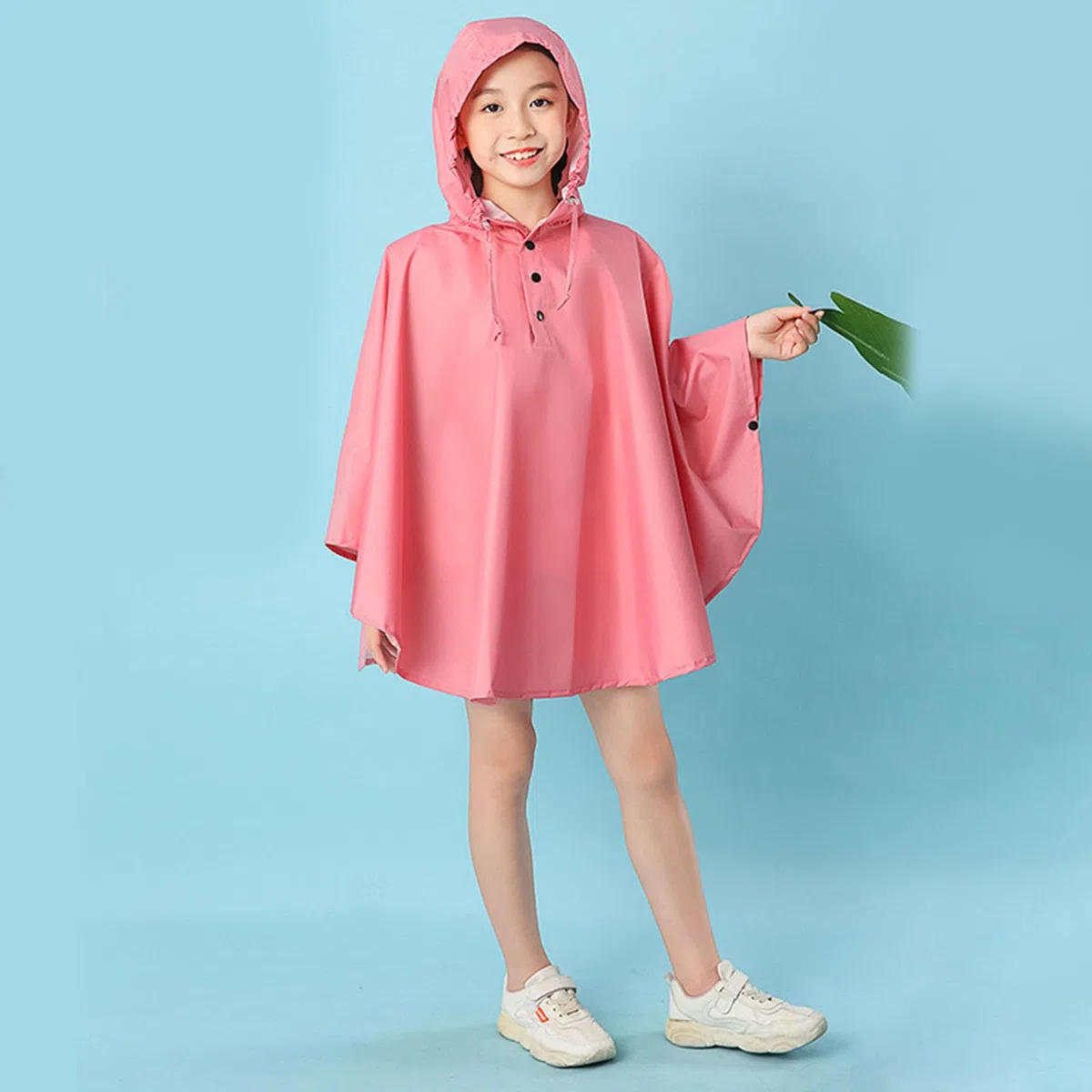 Generisch Poncho impermeable para niños de un solo color, con práctico bolso escolar