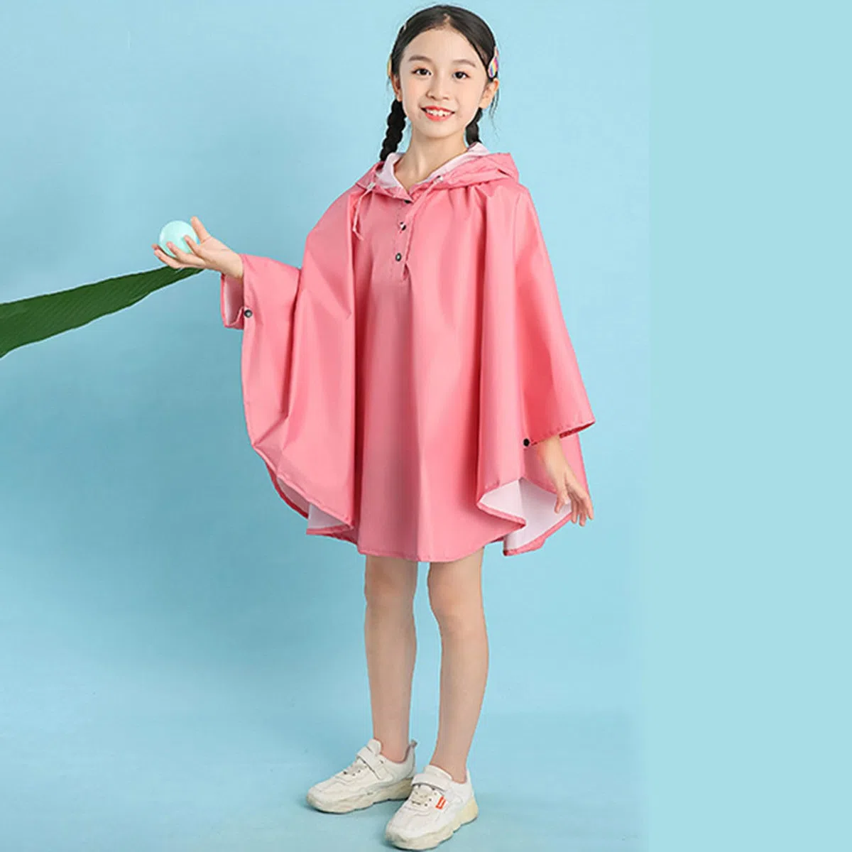 Generisch Poncho impermeable para niños de un solo color, con práctico bolso escolar