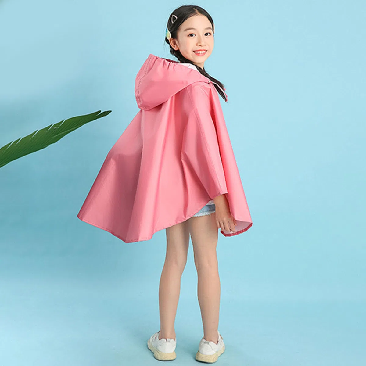 Generisch Poncho impermeable para niños de un solo color, con práctico bolso escolar